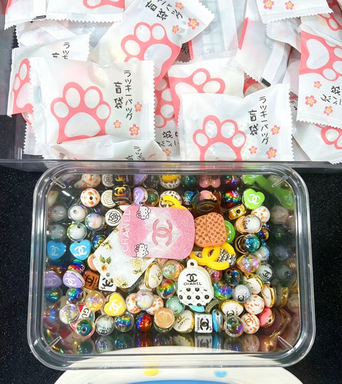 Charms/doll/beads/bottle/shoes 10 Blind Bag (get at least 15)